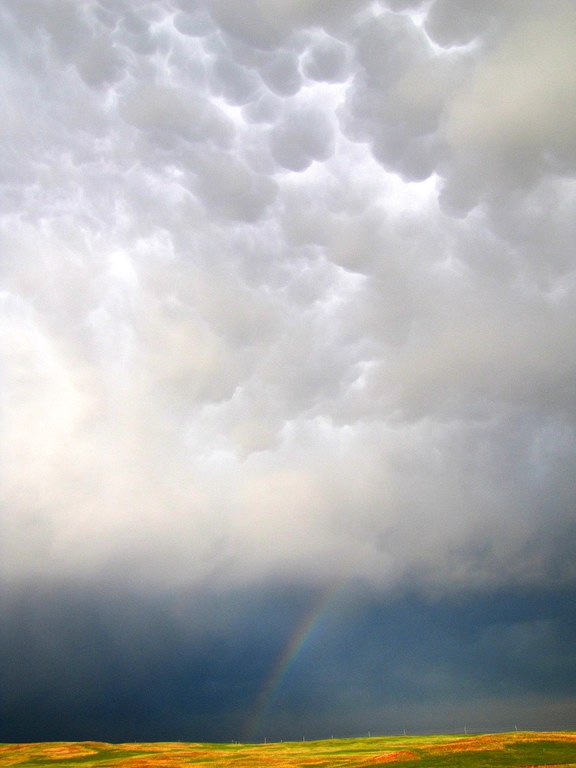 Brad Guay A rainbow and mammatus clouds in the Black Hills of South Dakota